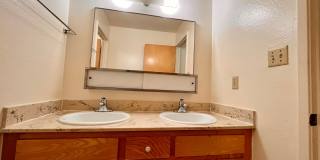 Charming 2BR Apartment with Balcony & Covered Parking – Live Near It All! Gallery 16