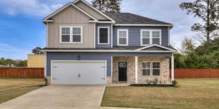 Discover comfort and convenience in this spacious 4-bedroom home, brimming with amenities, located in the desirable John's Landing neighborhood! Gallery 1