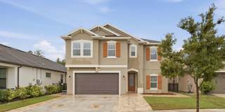 Tampa Palms Gem – Heated Pool, Outdoor Kitchen & EV Charger Gallery 1