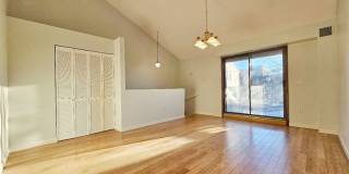 Beautiful renovated 3 bed 2 bath townhouse with deeded parking and easy Highway access Gallery 1