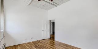 Evolve Real Estate: Bright Industrial-Style 1BD/1BA Condo in LoDo, Nearly 1,160 Sq Ft, Balcony and Rooftop Views! Gallery 11
