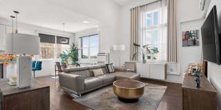 Bright South-Facing 2BR/2BA Condo | High Ceilings | NYC Views | 2 Garage Spaces Gallery 1