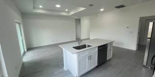 New 4 Bed / 2 Bath / 2 Car Garage Family Retreat in Desirable Lehigh Acres! Gallery 13