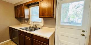 {7047} Prairie Village Ranch with Hardwood Floors + Large, Fenced Yard + 1 Car Garage Gallery 11