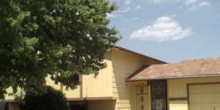Widefield side entry bi-level home. Gallery 1