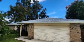 Spacious 4-Bedroom Retreat in Palm Bay – Multiple Living Areas & Endless Comfort! Gallery 1
