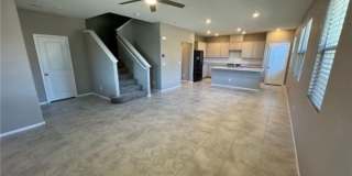 Modern 3-Bedroom Townhome with Open Living & Prime Henderson Location Gallery 1