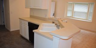 Beautiful 3 bedroom home with a den or office located in the prestigious Southern Dunes man gated golf community! Gallery 9