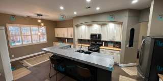 Open Kitchen, Expansive Living, and Covered Patio in Tranquil South Reno Near Trails, Parks & Shopping Gallery 6