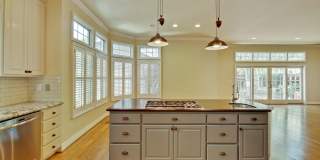 Stunning two-story spacious home on tranquil tree-lined street. Gallery 29