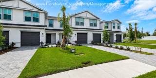 BRAND NEW TOWNHOME! AURORA at LAKEWOOD RANCH! MOVE IN READY OUTSTANDING LOCATION! Gallery 1