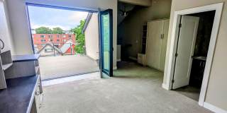 STUNNING 4-LEVEL TOWNHOME IN HIGHLANDS W/ 2-CAR GARAGE +AMAZING ROOFTOP DECK WITH VIEWS! Gallery 25