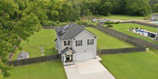 Newer Home On 3 Acres! Landscaping, Electric, Water, & Sewer Included In Price! Pet Friendly - Attached Garage w/Opener - Storage Shed! Gallery 1