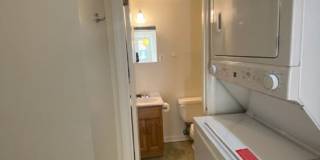 A charming two bedroom one and one half  bath row house located just off New Jersey Ave in the Shaw Neighborhood! Gallery 8