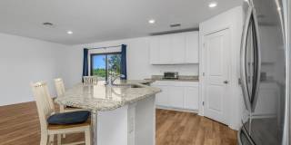 NOW AVAILABLE - 3/2 with 2 Car Garage in Mirror Lakes! Gallery 15