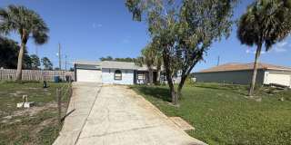 For Rent: Spacious 3BR/2BA Single-Family Home in SW Palm Bay on 0.67 Acre Lot Gallery 1