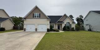 Spacious 4 Bed 3 Bath Home with Fenced Yard Gallery 1
