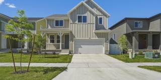 Stylish 4 Bed Home in Saratoga Springs with Open Layout & Big Backyard!! Gallery 1