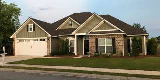 Spacious 4BR/3BA Grove Point Home with Screened Porch  Privacy Fence Gallery 1