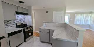 Updated Open-Concept with Sunroom & Finished Basement Space Gallery 6