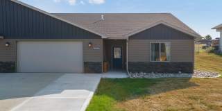 Stylish Living in a 3-Bed, 2-Bath Townhome with a 2-Car Garage Gallery 1