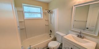 Newly renovated 3/1/1 NEW flooring, NEW paint, updated kitchen & bath, fenced yard.. a MUST SEE!! Gallery 9