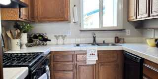 Charming 2 bed 1.5 bath condo, with attached 2 car garage! Gallery 4