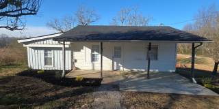 3-Bedroom Single-Family Home with Hardwood Floors and Carport in Sparta Gallery 1
