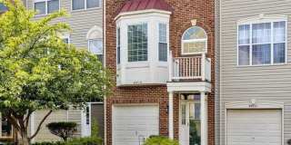 Well-Located 3BR, 2-Full, and 2-Half Bath Townhouse w/ One-Car Garage in Sterling, VA Gallery 1
