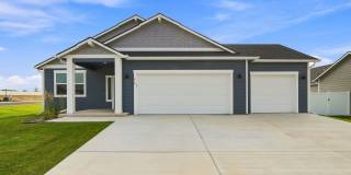 Modern 4-Bedroom Home with a 3-Car Garage & Covered Patio Gallery 1