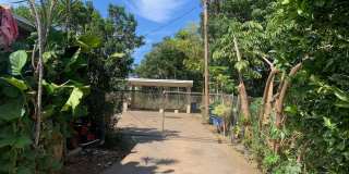 Makaha spacious duplex, 3 bedroom, 2 bath with 2 covered parking stalls, pet negotiable, fenced property Gallery 1