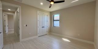 Brand-New Waterfront Luxury in Cape Coral | Heated Pool, Spa, Outdoor Kitchen & 3-Car Garage Gallery 22