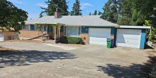 Tukwila/SeaTac daylight rambler - large home for rent - 4 bedrooms 2 bathrooms with 2 kitchens - Available now! Gallery 1
