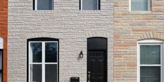 Modern 3BR Rowhome with Finished Lower Level & Rear Deck Gallery 1