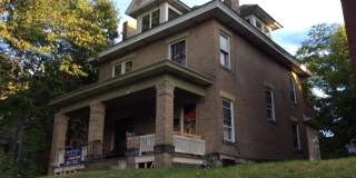 6 bedroom 2 full bath single family home with yard Gallery 1