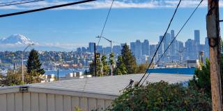 Three Bedroom Fremont Home with a Private Lower Level Suite, Fenced Yard and Driveway Parking Gallery 1