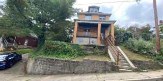 Updated 3-4 BR House with fenced yard & off street parking! Gallery 1