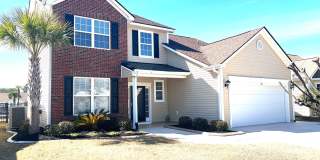 Beautiful Four Bedroom, 2.5 Bath Home, plus Bonus room! Now Available in Little River! Community Pool! Gallery 1