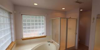 $500 move-in special_Spacious Country Club Home | 3-Car Garage + Basement Bonus Area Gallery 17