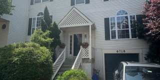 Stunning 3–4 Bedroom Townhome in Private Community | Garage + EV Charger | Deck with Tree Views Gallery 1