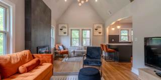 Completely remodeled like new Gingerbread midtown cottage with gleaming hardwoods, converted from a 3/1 to a 3/2. Gallery 9
