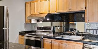 $500 off! Spacious 1-bdrm/1-bath condo in quiet neighborhood. Balcony, 2 parking spaces, fireplace, hot tub, & pool Gallery 24