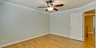 Stunning two-story spacious home on tranquil tree-lined street. Gallery 42