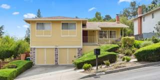 Stunning El Sobrante Hillside Home with Sweeping Views, Expansive Deck & Generous Yard Gallery 1