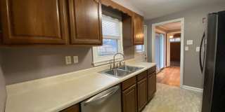 {7047} Prairie Village Ranch with Hardwood Floors + Large, Fenced Yard + 1 Car Garage Gallery 12