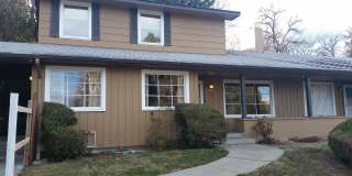 Occupied, do not disturb tenants. 1950's Craftsman 2br 2ba duplex on two levels, lawncare provided, w/d included Gallery 1