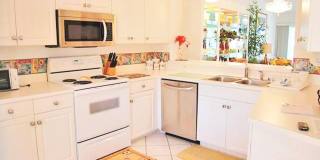 Bright and airy in beautiful gated community - lake views and Florida sunshine! Gallery 1