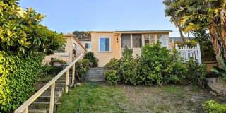 Welcome to your beautiful beach cottage, perfectly situated in Ocean Beach! Gallery 12
