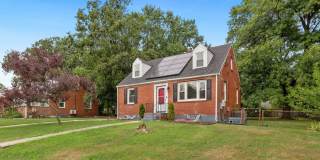Move-In Ready Cape Cod with 3 Finished Levels & Huge Backyard Gallery 1