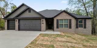 Fabulous New Construction Rental in Bella Vista Featuring a Rare 3-Car Garage Gallery 1